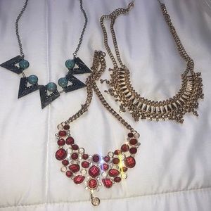 Three bib necklaces